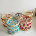 colorful paper rattan wrapped glass drinking glass